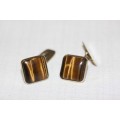 A stunning pair of 9ct yellow gold gents "whale-back" cuff-links w/ beautiful deep tigers eye stones