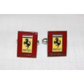 An extremely rare set of vintage (c1960's) Ferrari Club of America silver metal enamelled cuff-links