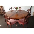 A magnificent round Kingwood inlay/ finished dining table with solid brass lion feet caps - STUNNING
