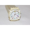 An amazing vintage (1980's) Uni-sex Swiss made Swatch "Tutti Frutti" watch with a watch guard cover