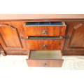 A stunning teak side server with loads of space w/ cutlery drawers and ornate handles