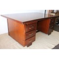 An awesome "curved front" office/ executive desk with ample drawers in great condition