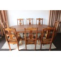 An absolutely magnificent African Blackwood 8-seater dining suite in exquisite condition - WOW