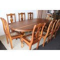 An absolutely magnificent African Blackwood 8-seater dining suite in exquisite condition - WOW
