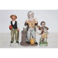 Three lovely ceramic figurines with hand painted detailing - all in good condition