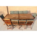 An amazing solid wooden 10-seater garden/ patio set including 10x chairs w/ cushions & extend table