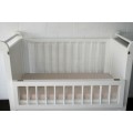 Price reduced!!! White babies crib bed/ cot w/ brass safety latches, fold-down side & large draw!