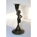 A beautiful cast iron cherub candle holder in excellent condition - perfect for a living room