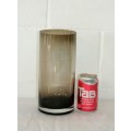 A gorgeous tall "smokey" black glass vase with a thick heavy base and nice clean lines