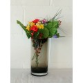 A gorgeous tall "smokey" black glass vase with a thick heavy base and nice clean lines