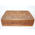A fantastic hand carved wooden jewellery/ storage box with lovely detailing on it! Gorgeous!