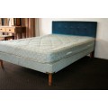 A stunning upholstered double-bed buttoned headboard with a Warner mattress & base.RS17Bed