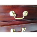 A wonderful Mahogany four-drawer pedestal/ chest of drawers with brass handles in good condition