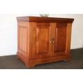 A wonderful Mahogany mini bar cabinet with shelves inside and a removable glass top on castors