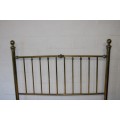 An amazing vintage Queen-size brass bed with a stunning brass headboard and footboard.RS17Bed