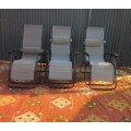 Five stunning metal and mesh reclining outdoor pool loungers in great condition - price/recliner