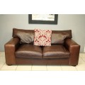 A superb and extremely well made (large) genuine leather 2-seater couch in stunning condition