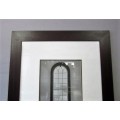 **RS17** A (large) black and white photograph of a "window" in a complimentary broad-border frame