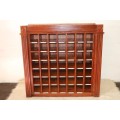 An awesome 49 bottle (floor cabinet) wine rack with individual wine bottle slots and sections