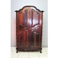 An amazing gabled double-door solid Imbuia ball & claw wardrobe w/ solid brass embellishments