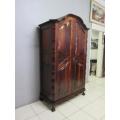 An amazing gabled double-door solid Imbuia ball & claw wardrobe w/ solid brass embellishments