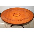 A fantastic Italian oval occasional/ sewing table with wonderful floral marquetry inlay detailing