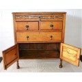 A wonderful vintage four-drawer "Belweb" Oak tallboy chest of drawers w/ ornate carvings - awesome!