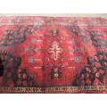 A wonderful vintage Persian Carpet (2.3m x 1.4m) in deep red, black and rust colours - stunning!