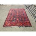 An amazing vintage Persian Carpet (1.9m x 1.4m) in deep red, blue and black detailing - wow!