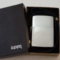 A stunning authentic Zippo "Classic brushed chrome" lighter in excellent condition in original box
