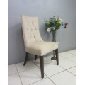 A stylish and beautifully upholstered hi-back occasional chair in a quality linen upholstery fabric