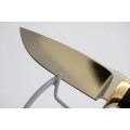 An awesome Piet Cirey "skinning" knife with brass trimmings in its original leather sheath