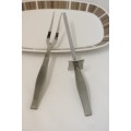 **RS17** An Eetrite "Valiant design" stainless steel matching carving fork and knife sharpener.