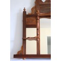 A beautiful antique Edwardian hand carved mahogany wall-mountable "over" mantle mirror