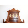 A beautiful antique Edwardian hand carved mahogany wall-mountable "over" mantle mirror