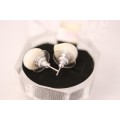 An amazing pair of white cultured baroque pearl earrings in a stunning see-through gift box