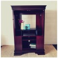 A gorgeous mahogany TV-Cabinet with two doors and ample space for an entertainment system