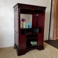 A gorgeous mahogany TV-Cabinet with two doors and ample space for an entertainment system