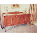 An exquisite vintage side server cabinet with carved detailing and loads of drawer & cupboard space