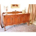 An exquisite vintage side server cabinet with carved detailing and loads of drawer & cupboard space