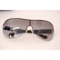 **rs17** A pair of black Armani Exchange (model AX2007) unisex sunglasses in its original case