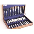 A stunning 56 piece Eetrite stainless steel cutlery service in the Impulse pattern in its canteen