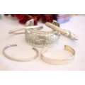 An incredible collection of 5x assorted silver metal bracelets and bangles; prefect stocking fillers