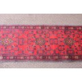 An incredible and beautifully made (154cm x 54cm) Pakistani Bokhara carpet in beautiful condition