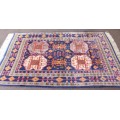 A beautiful and very well made colourful Russian Derbent carpet in light & dark blue, reds and rust