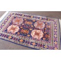 A beautiful and very well made colourful Russian Derbent carpet in light & dark blue, reds and rust