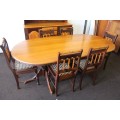 A superb Yellowwood and Imbuia dining room suite including table, 6x chairs & buffet server cabinet!