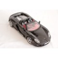 A fantastic black 1/18 scale (2005) Porsche Carrera GT die-cast model car by Motormax