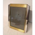 **RS17** A stunning medium sized silver and gold coloured free standing photo frame with glass.