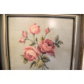 A lovely framed (behind glass) hand made tapestry of roses in great condition.